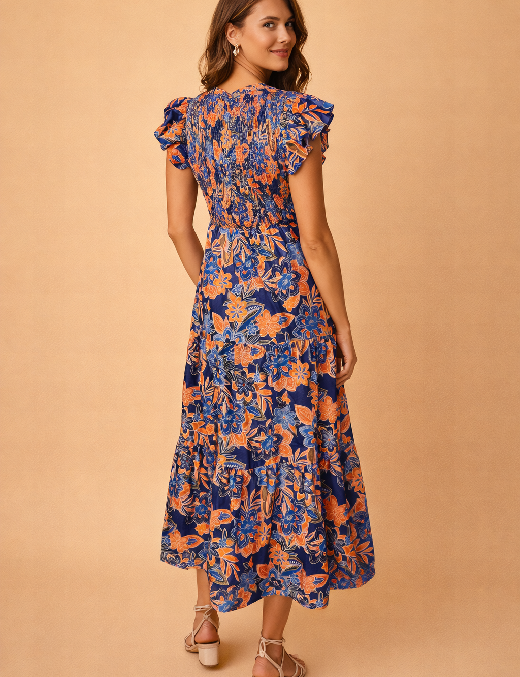 polish-model-backview-blue-orange-floral-midi-dress-studio-posed-shot_f9119575-308b-4bd1-a0a1-d93aecfdfdc4.png
